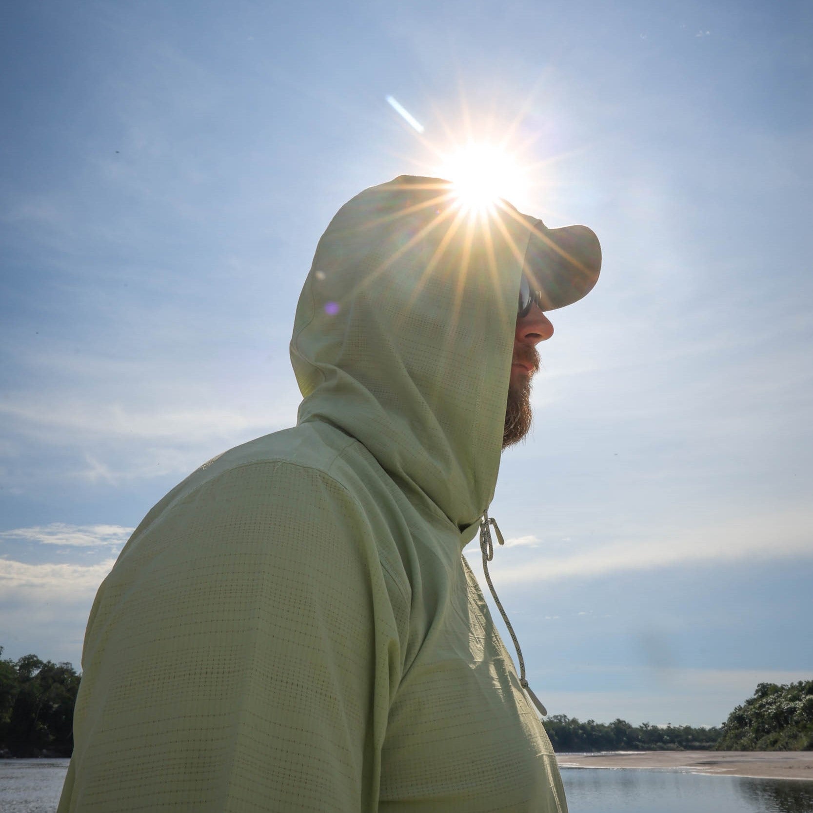 man with lichen green flolite hoody on