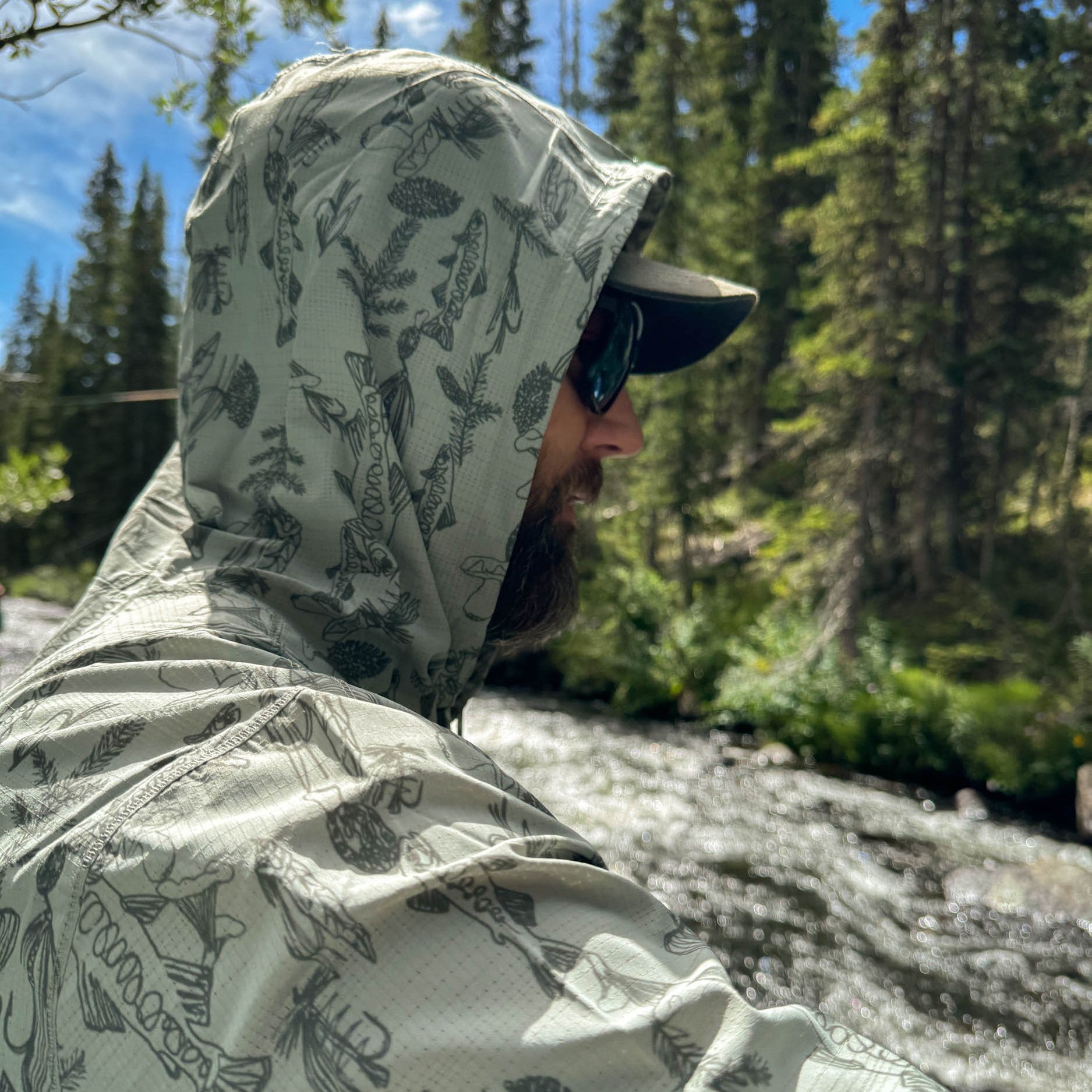 man with hood on of the spring forest flolite sun hoody