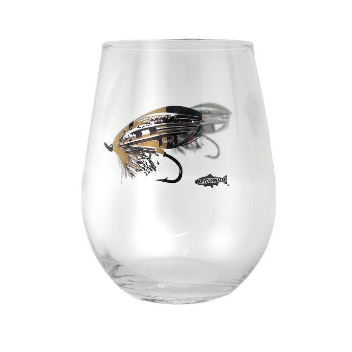 wine glass with a classic salmon fly on the side in black and gold ink